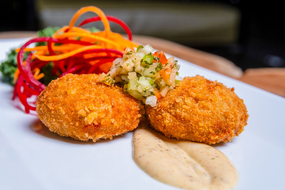Golden fritters with slaw and dipping sauce for a new restaurant's menu